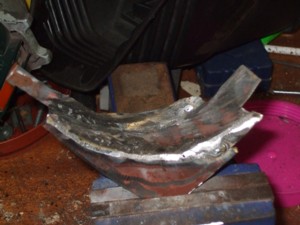 Plate to repair front door post.